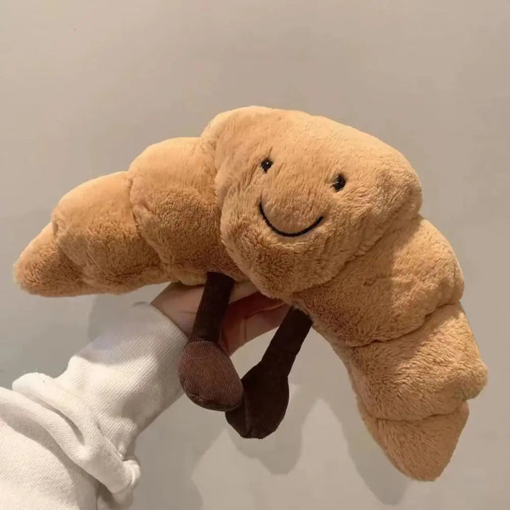 Croissant-Plushkudde | Mjuk 33 cm Ljusbrun Kudde med Leende Ansikte