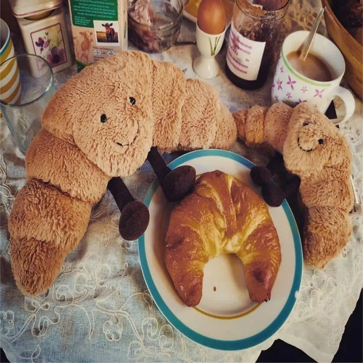 Croissant-Plushkudde | Mjuk 33 cm Ljusbrun Kudde med Leende Ansikte